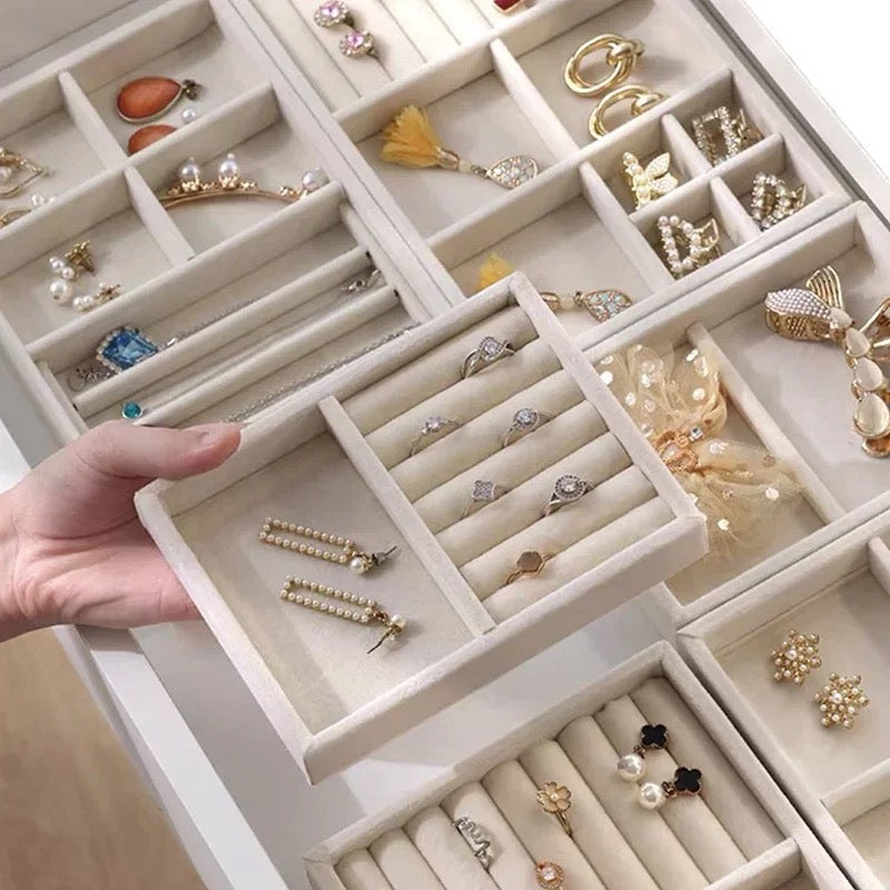 Drawer jewelry organizer storing rings earrings and bracelets